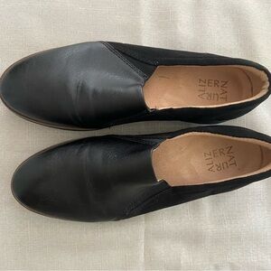 Black leather and suede loafers.